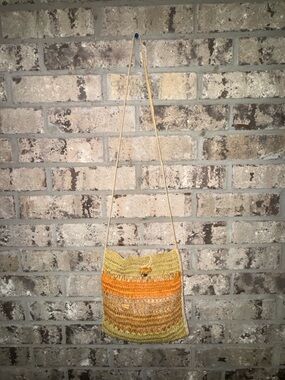 Scala Collection woven straw crossbody tote bag with animal toggle closure